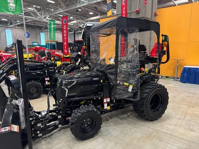 Captain tractor fitted with a 40 inch Bercomac winter cab indoors