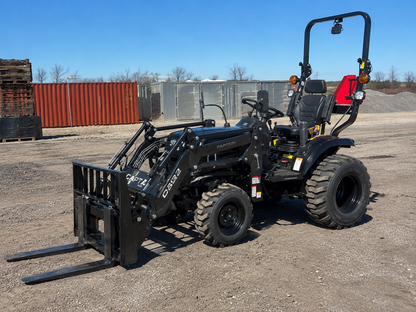 Captain tractor with Mapleside pallet fork attachment